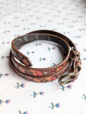American Rag thin brown floral leather belt with bronze buckle
